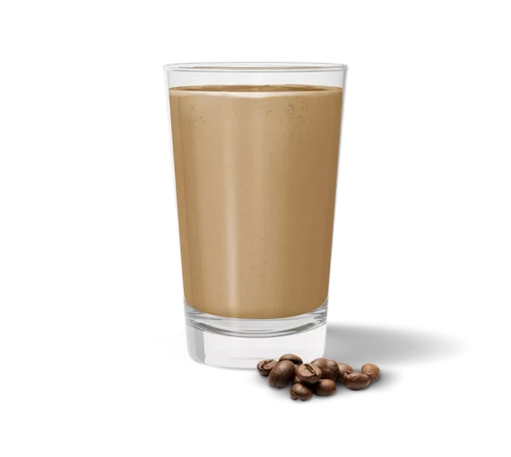 Herbalife Formula 1 Café Latte Shake Mix in a glass, ready to enjoy
